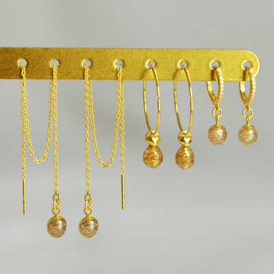 Lyvine, Laufey and Lusia earrings in gold-plated 925 sterling silver side by side